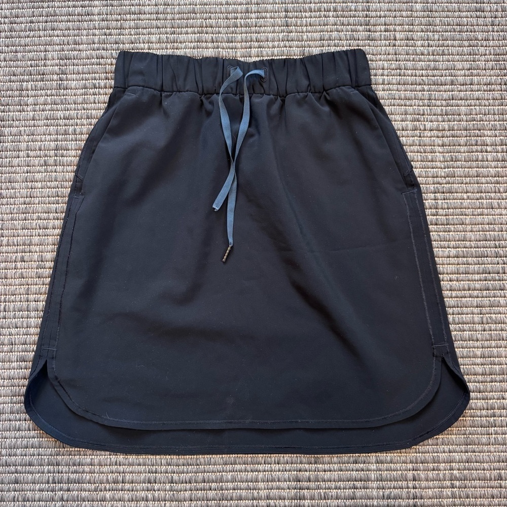 lululemon On The Fly Black Mini Skirt with Blue Drawstring